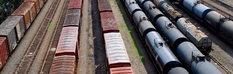 Remove oil from water in railroad yards