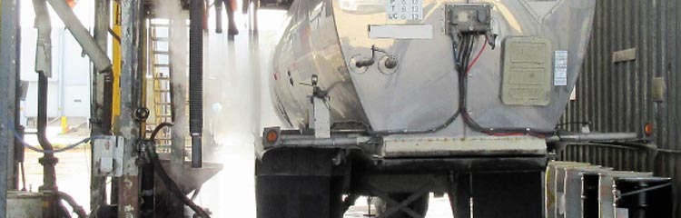Remove oil from water at tank truck wash facilities
